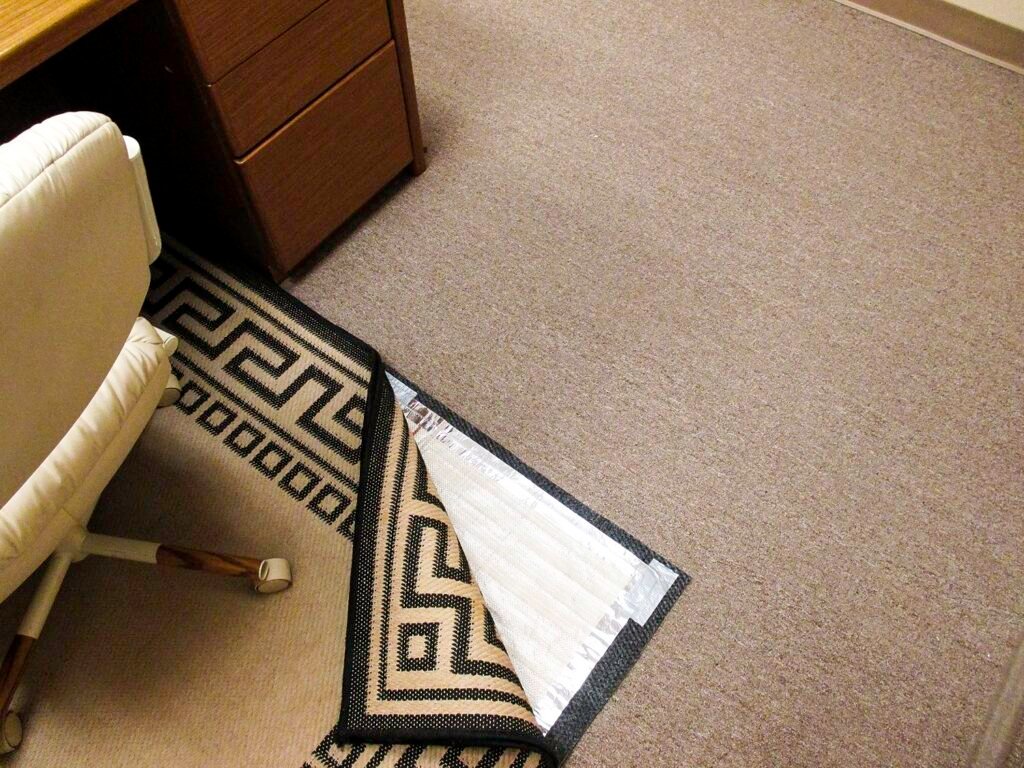 Underfloor heating for carpets